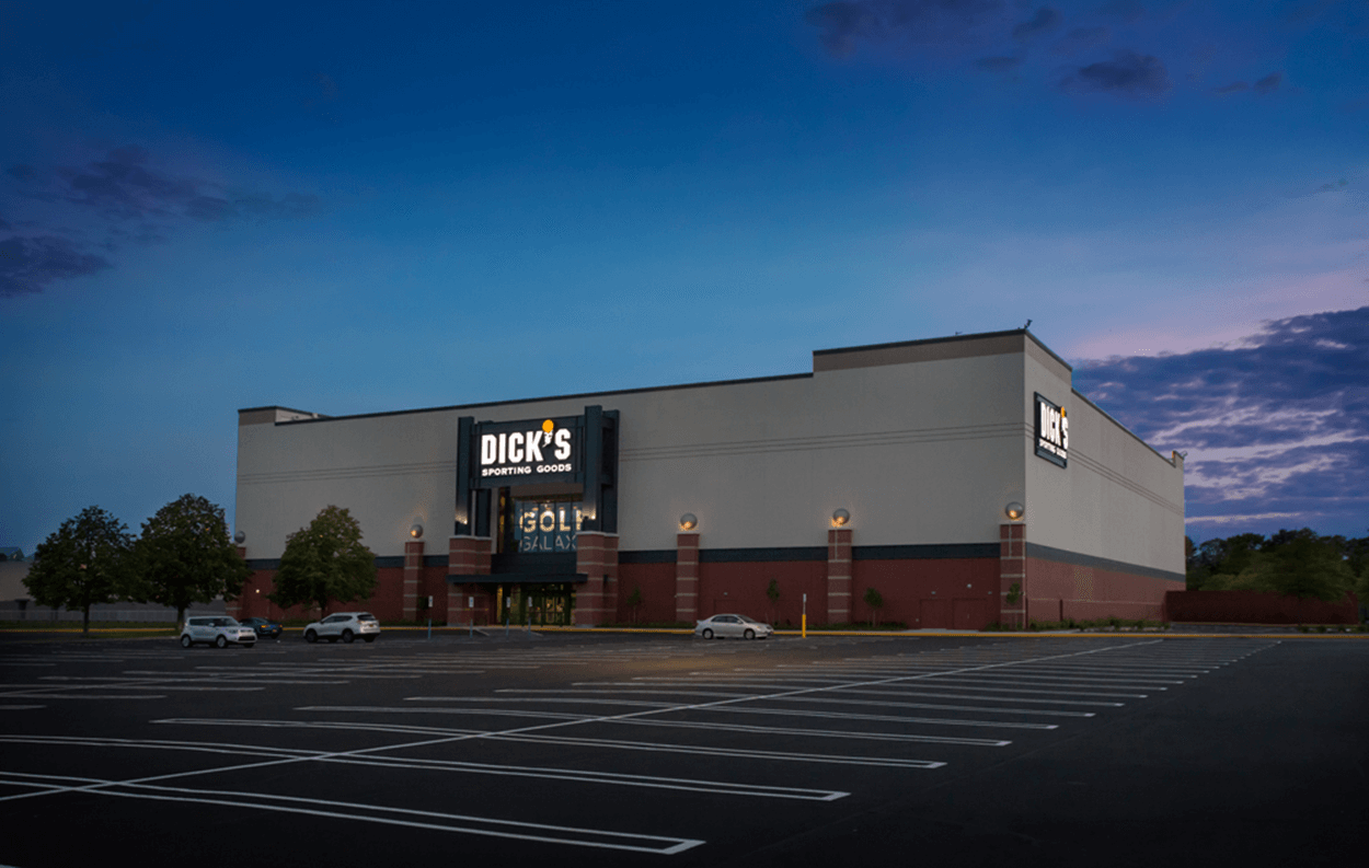 Exterior night shot of Dick's Sporting Goods at South Shore Mall