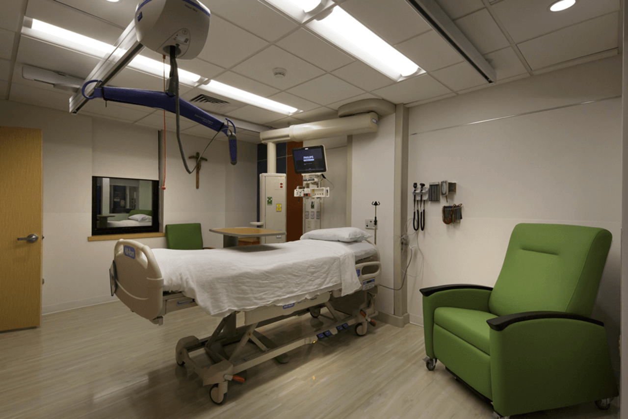 Hospital patient room with bed